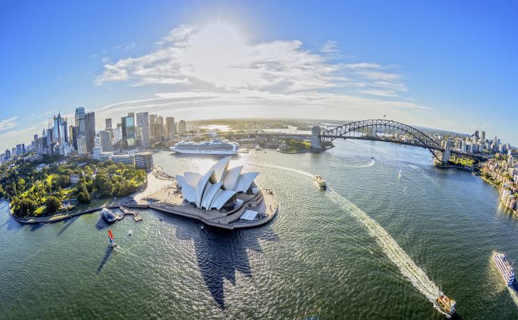 Aerial of Sydney harbour Opera House, Royal Botanic Gardens and the Sydney Harbour Bridge